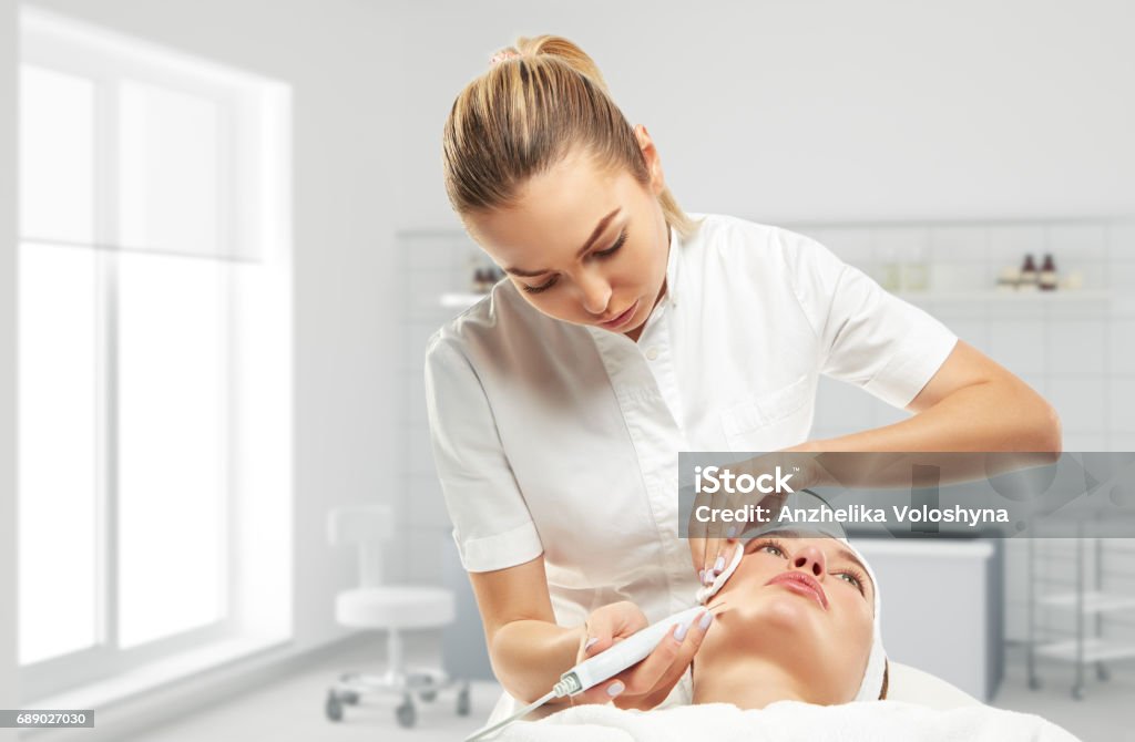 One day in the clinic of aesthetic medicine Clinic of Aesthetic Medicine. The procedure of Venus viva. Design Stock Photo