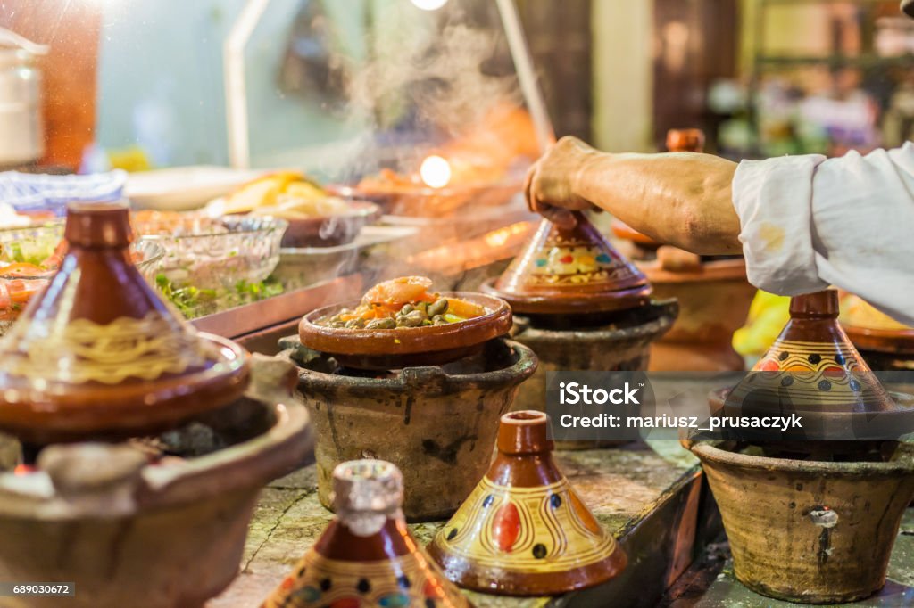 Selection of very colorful Moroccan tajines (traditional casserole dishes) Morocco Stock Photo