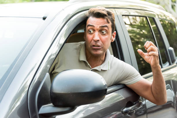 istock Stressed Mature man driving his car 689033310