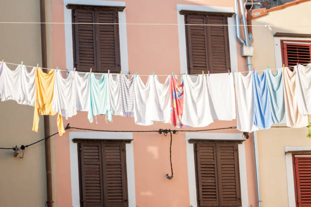 istock laundry drying outside in the town 689041552