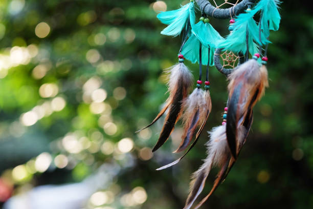 istock Soft focus and blurred Dream Catcher Blue Coral with natural background in vintage style. boho chic, ethnic amulet. 689048104