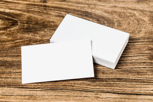 istock Business card on wood 689048324