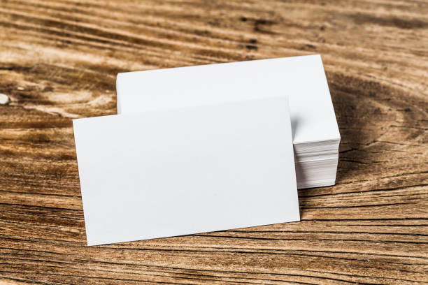 istock Business card on wood 689048334