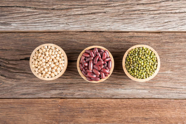 istock Soy bean, Red bean, Green bean in wood bowl. 689051976