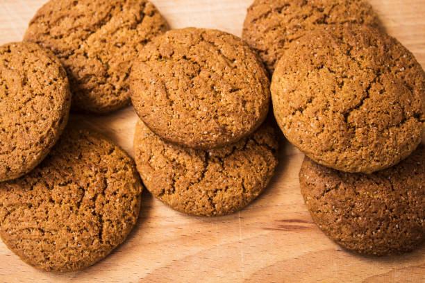 istock Oatmeal cookies on wooden background 689054806