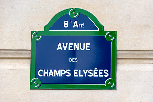 Street sign of the rue Champs-Élysées in the 8th arrondissement of Paris, France.