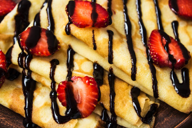 istock crepes on ceramic plate with strawberry and chocolate 689055174