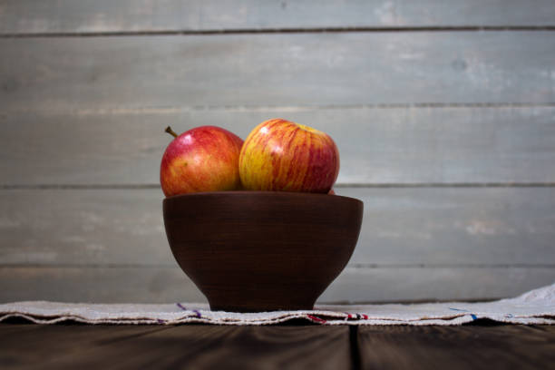 istock apples on the wooden board 689058782