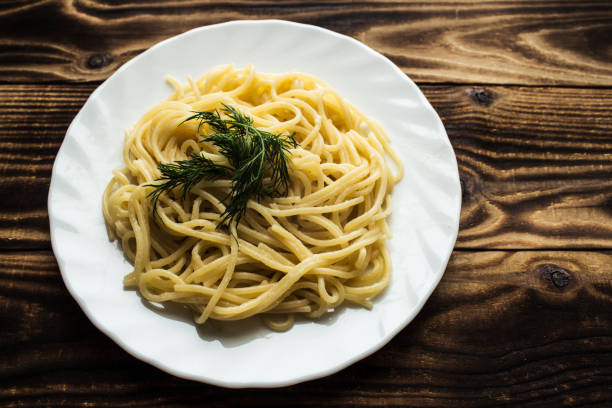 plate with spagetti and dill