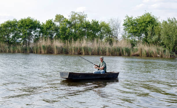 istock fisherman-fishing on river 689068838