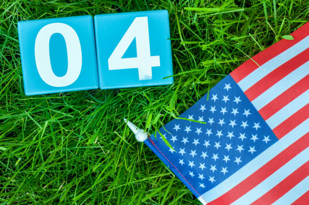 istock July 4th wooden color calendar on blue background. Summer day. Empty space for text. Independence Day Of America 689079102