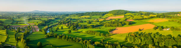 green pasture idyllic rural valley summer farmland villages aerial panorama - river usk imagens e fotografias de stock