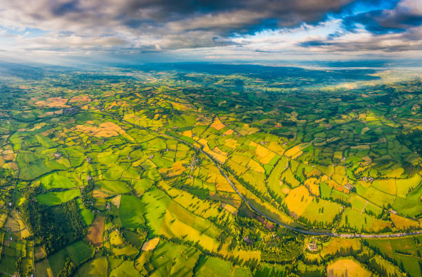 istock Aerial panorama over patchwork pasture idyllic summer countryside farms fields 689082884