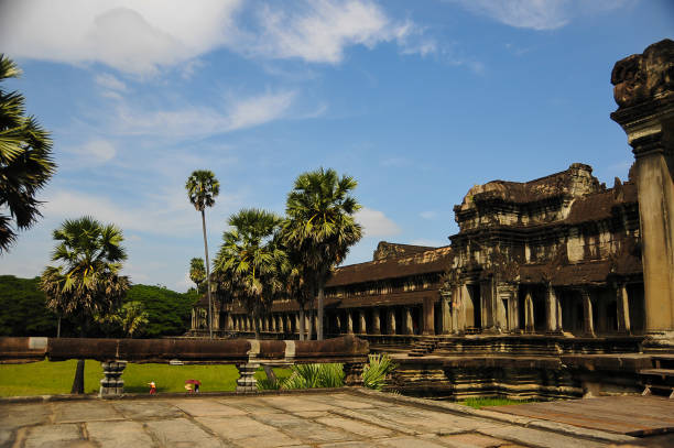 Front view of majestic Angkor Wat temple ruins, Cambodia. It's the largest religious monument in the world by land area.