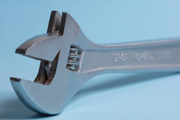 istock An adjustable spanner or adjustable wrench, French key, Crescent wrench tool close up. 689093200