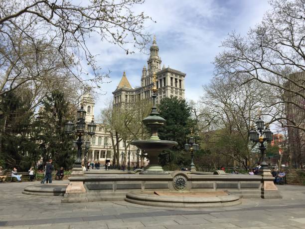 istock Fountain at City Hall park with blue sky, New York 689097488