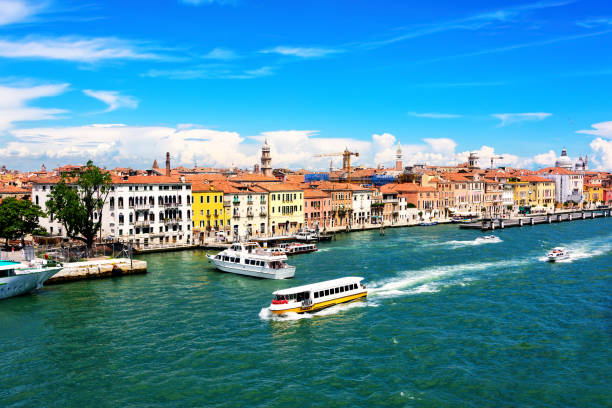 Lagoon in Venice, Italy with water taxi's and coastline architecture