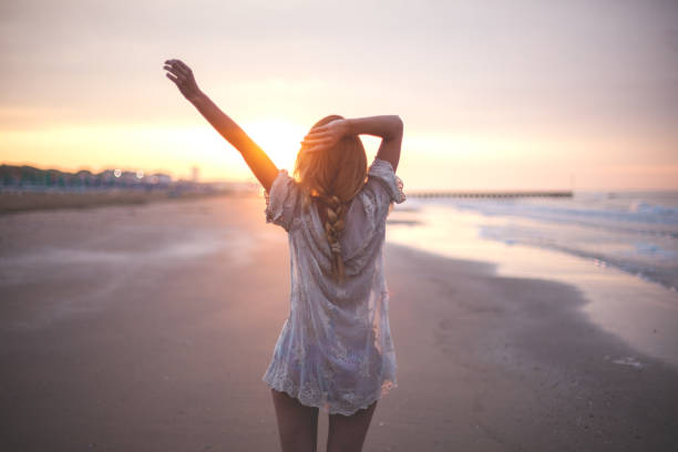 istock Dreamy girl  on beach 689109452