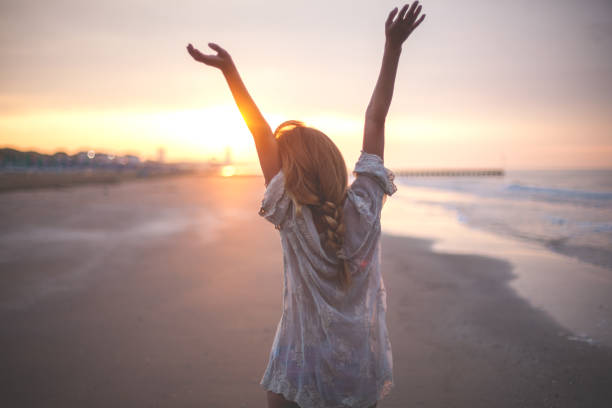 istock Dreamy girl  on beach 689115444