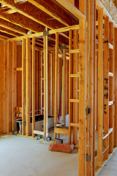 istock unfinished wood frame building or house 689134392