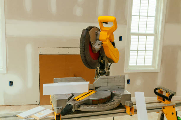istock man cutting wood on electric saw 689134580