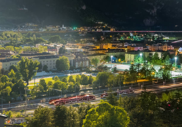 Sustainable transport concept, traffic and railway transport. skyline of Trento, Italy