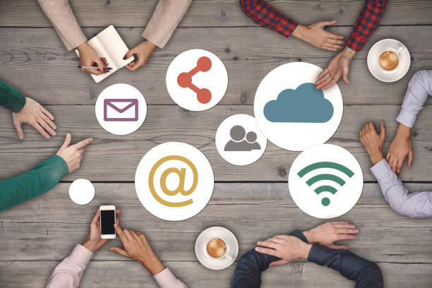 istock Teamwork concept - top view of six creative people working Social Media Icon Concept 689148660