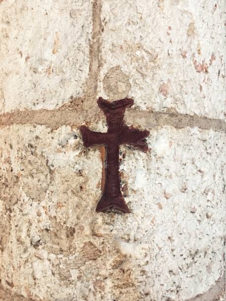 istock Cross of Christ with stone texture 689157112
