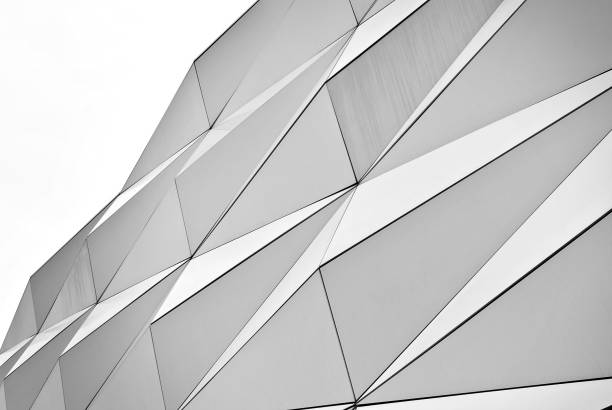 istock Polygonal triangle glass facade of modern building. 689162602