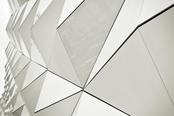 istock Polygonal triangle glass facade of modern building. 689163256