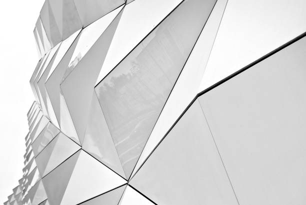 istock Polygonal triangle glass facade of modern building. 689165306