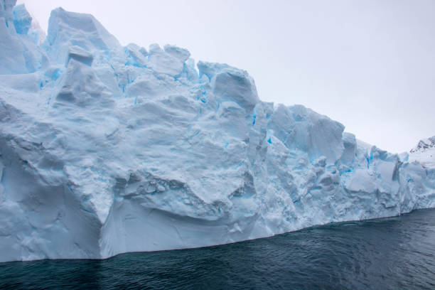 istock Antarctica: Iceberg in the Lemaire Channel 689166224