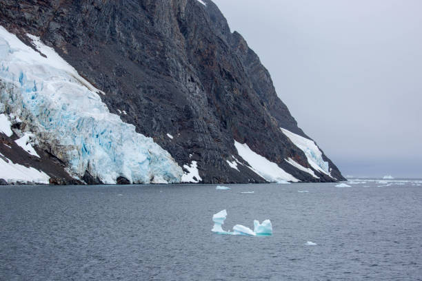 istock Antarctica: Iceberg in the Lemaire Channel 689172452
