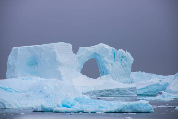 istock Antarctica: Iceberg in the Lemaire Channel 689172670