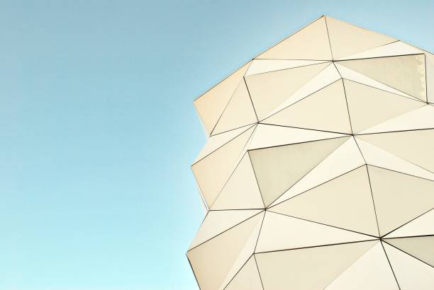 istock Polygonal triangle glass facade of modern building. 689179490