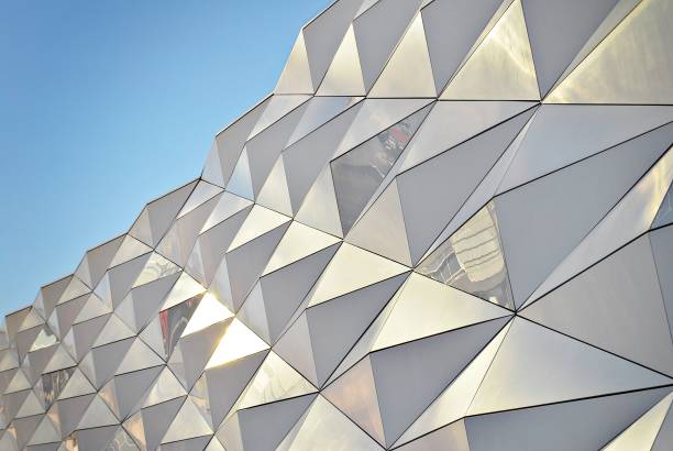 istock Polygonal triangle glass facade of modern building. 689179948