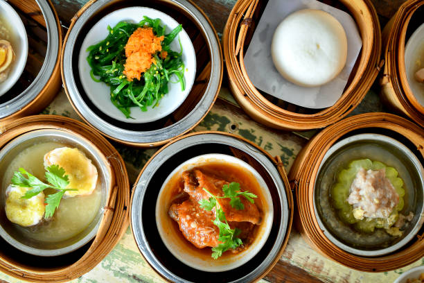 istock yumcha, dim sum in bamboo steamer, chinese cuisine 689180118