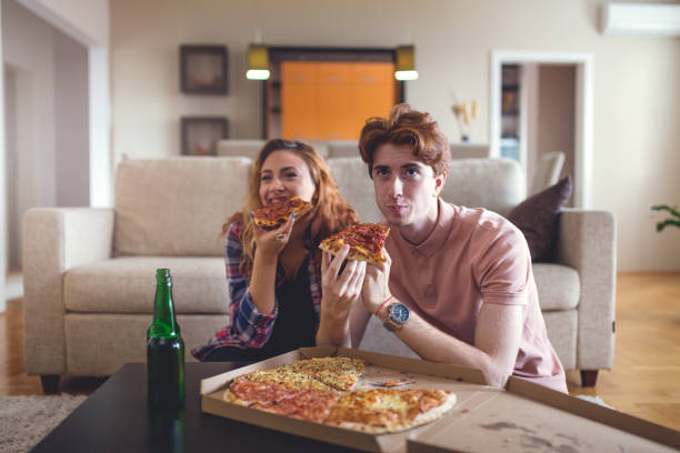 istock Lazy afternoon with pizza and TV 689182264