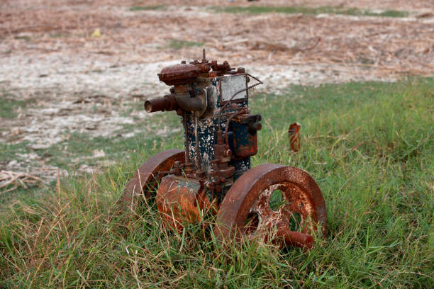 istock Old irrigation diesel engine in the field 689191094