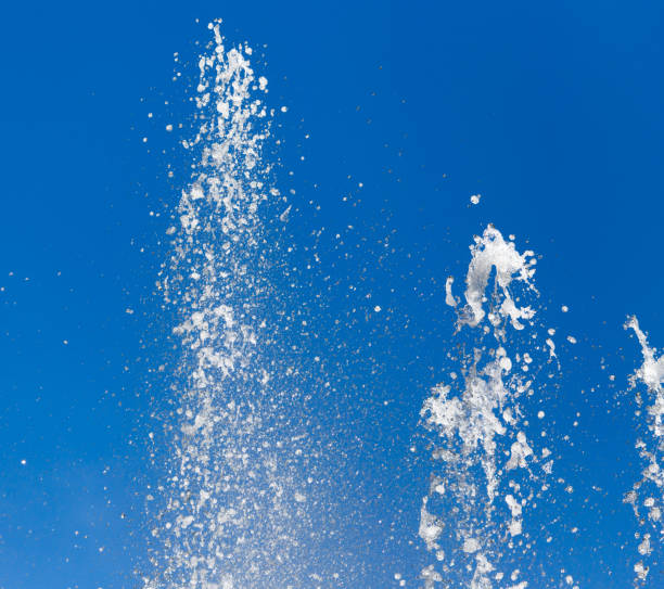 istock Splashing water against the blue sky 689209260