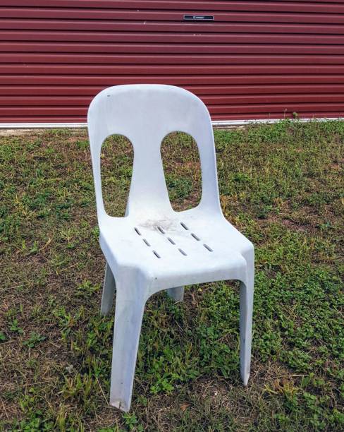 istock Chair against green and red background. 689216864