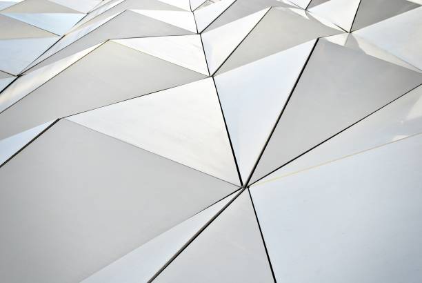 istock Polygonal triangle glass facade of modern building. 689234658