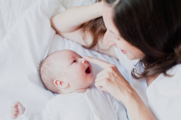 istock Baby looks at mother 689241632