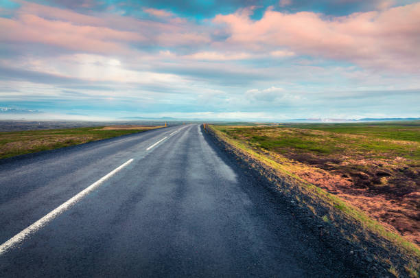 istock Empty asphalt road with colorful cloudy sky. 689245960