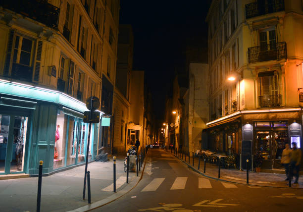 istock Paris street and cafes at night 689246196