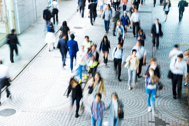 istock crowde people on street in modern city 689249016