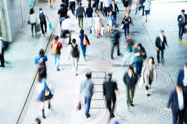 istock crowde people on street in modern city 689249226