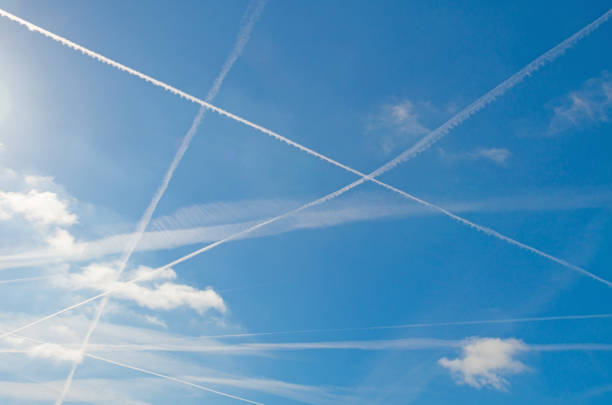 istock Triangle of contrails in a blue sky in spring 689249554