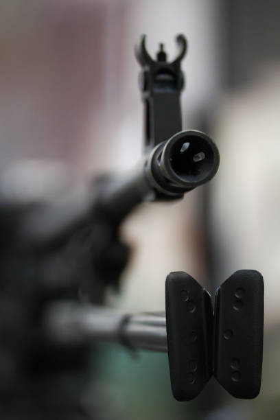 istock Automatic rifle - blurred the sight of the machine 689255410