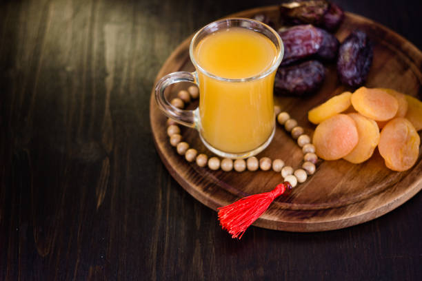istock Ramadan juice for iftar made from fresh apricots with dried apricots and dates. 689263112